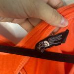 The North Face cross back orange athletic top size mediu Photo 1