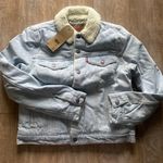 Levi's Levi’s Original light wash sherpa trucker jacket S NEW. Retails $98. Photo 0