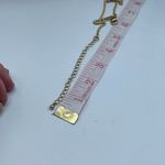 White House | Black Market WHBM “L” dangle rhinestone gold colored choker . Photo 6