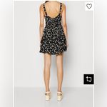 Gap  Small Black Ditsy Floral Bow Tie Back Ruffle Tiered Hem Mini Dress NWT Photo 1