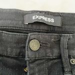 EXPRESS Midrise Black Ripped Skinny Jeans Photo 2