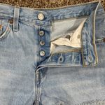 Vintage Levi's 501 light wash distressed jeans. Waist 27 (2" inseam) Photo 2