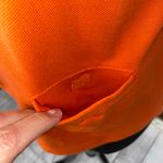 Lady Fairway 1/4 zip polo golf shirt with side golf ball pocket orange sz SM Photo 1