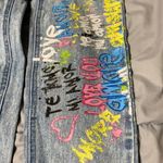 Tinseltown  Women's size 7 High Rise Mom Jeans Painted Leg Detail Light Wash Blue Photo 3