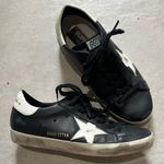 Golden Goose  Black and White Star Sneakers Photo 0