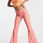 ASOS Orange Pink Heart Print Flare Pants Photo 0