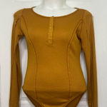Free People  Sloane Bodysuit Long Sleeve Snap V Neck Ribbed Amber Size L Mustard Photo 0