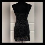 Wild Fable black velvet/sheer mini little black Dress - Size Small. Gently warn & excellent condition. Velvet & sheer appears distorted in pictures but is not. It’s the shine coming off the velvet and is beautiful. Measurements approximately 14” from armpit to armpit x 25” long from chest to bottom. Non-smoking home. priced to sell at as is condition. Don’t like my price, make reasonable offer! And thank you for checking my closet. Photo 1
