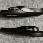 REEF  Women’s Cushion Court Black Flip Flops Photo 0