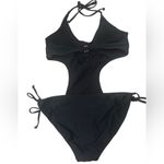 One piece cut out win suit with crochet detail no tag fits Sz med/large 6/8 Black Photo 1