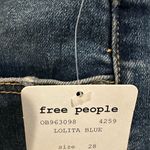 We The Free Free People Lolita Blue high rise curvy button fly distressed frayed hem… Photo 2