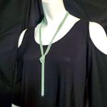 Charming Charlie Shimmering Knot Necklace Photo 0