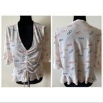 Elodie  Cream Peplum Bell Sleeve Eyeglasses Motif Blouse Size L Photo 3