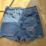 Levi's Distressed High Rise Denim Shorts in Sapphire Dust - Size 24, Medium Wash Photo 0
