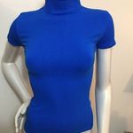 Poof! Thick ribbed neck, sleeves, & bottom shaper top Photo 0