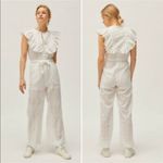 Urban Outfitters White Magnolia Eyelet Button Up Sleeveless Ruffle Jumpsuit Photo 1