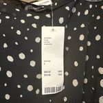 Urban Outfitters NWT  Women Black Ruffle Hem Polka Dot Wrap Mini Skirt Size Large Photo 6