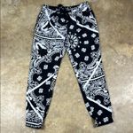 Tibi  Monochrome Floral Print Pants
Size: 2 Photo 0