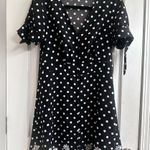 EXPRESS Black and White Polkadot Sort Sleeve Sundress With Embroidered Hemline Photo 0