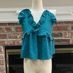 Romeo + Juliet Couture  turquoise ruffled crop top with lace up back / M … Photo 8