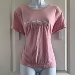Reebok  Women's Soft Pink Tee  Chic and comfy short sleeve tee. Ideal for everyday wear.Small stains shown.  Photo 0