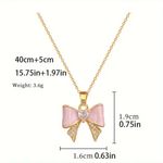 Pink Enamel Bow Pendant Necklace Gold Tone Chain Crystal Center NWT Photo 3