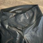 We Wore What  black sheen crossover leggings Photo 2