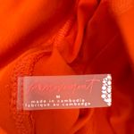 Free people movement skort, NWT! Orange Size M Photo 2