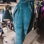 The Comfy rain + rose TEAL GREEN faux fur long sleeve jacket with pockets soft warm New with tag  Smoke and pets free  Same day shipping Faux fur: No ANIMALS WERE HARMED IN THE MAKING OF THIS FASHION THIS GARMENT HAS BEEN HANDCRAFTED BY Rain + Rose STAFF FOR YOUR COMFORT Photo 2