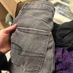 American Eagle  Next Level Stretch grey black distressed skinny jeans raw hem Photo 2