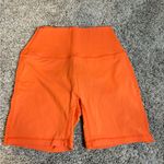 Set Active  biker shorts orange size medium Photo 1