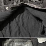 Levi's Vintage washed black denim jacket
Tagged a kids large - fits a womens XS Photo 3