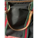 Classic Travel Bag with Leather Handles and Buckle Detail Black Photo 4