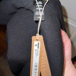 SKIMS Cotton Fleece Pullover Hoodie in Onyx Photo 6