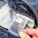 American Eagle Distressed Mid Rise Skinny Jean Photo 9