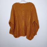 Unif  × Urban Outfitters burnt orange sweater size small Photo 4