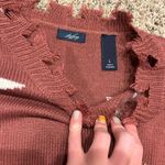 Buckle Star Sweater  Photo 1