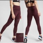 Athleta Persistence Camo Laser Cut 7/8 Tight in Antique Burgundy Photo 1
