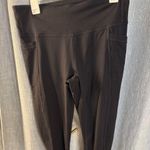 Athleta  High Rise Ankle Zipper Side Pocket Legging, Black, Size Large Photo 0