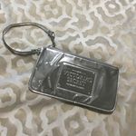 Victoria's Secret Victoria’s Secret Shiny Silver Wristlet Photo 3