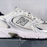 New Balance Women's size 7/Mens size 5.5 530 white blue silver Photo 0