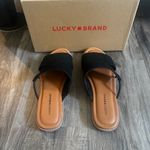 Lucky Brand  Black and Tan Slide Sandals Photo 1