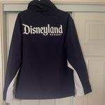 Disney NWT  Parks Disneyland Resort Zip Up Windbreaker  Blue & White Photo 1