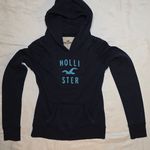 Hollister Women's Navy Hoodie with Teal Logo Photo 0