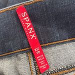 Spanx Shape and Lift high-rise distressed skinny jeans in mid wash Sz XS Petite Photo 12