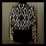 Nine West black/wht crop cardigan sweater. Size Medium. ***Refer to measurements as size tag removed. Beautiful. One large buttons @top. Gently warn & excellent condition. Measurements approximately 19” from armpit to armpit x 16” long. Non-smoking home. Priced at as is condition. Don’t like my price make a reasonable offer! And thank you for checking my closet! Photo 1