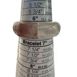 Quartz Stretch Bracelet sitting at 6.5" one stone is broken See pictures Photo 3