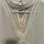 Entro  White Keyhole Cutout
Tank Blouse size large Photo 1