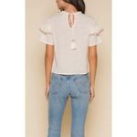 Raga Anthropologie |  embroidered tie back ruffle top Photo 1