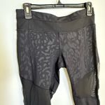 Lululemon  cropped leggings black animal print and mesh size 8 Photo 1